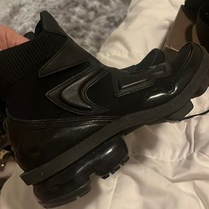 Nike black sneakers .. leather and stretch fabric